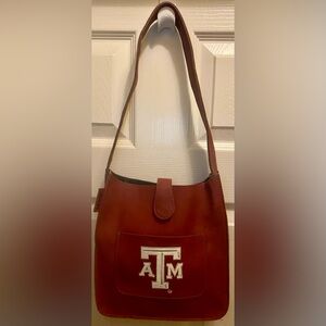 Texas A & M University maroon tote/purse; cross body bag, Velcro closure; NEW.